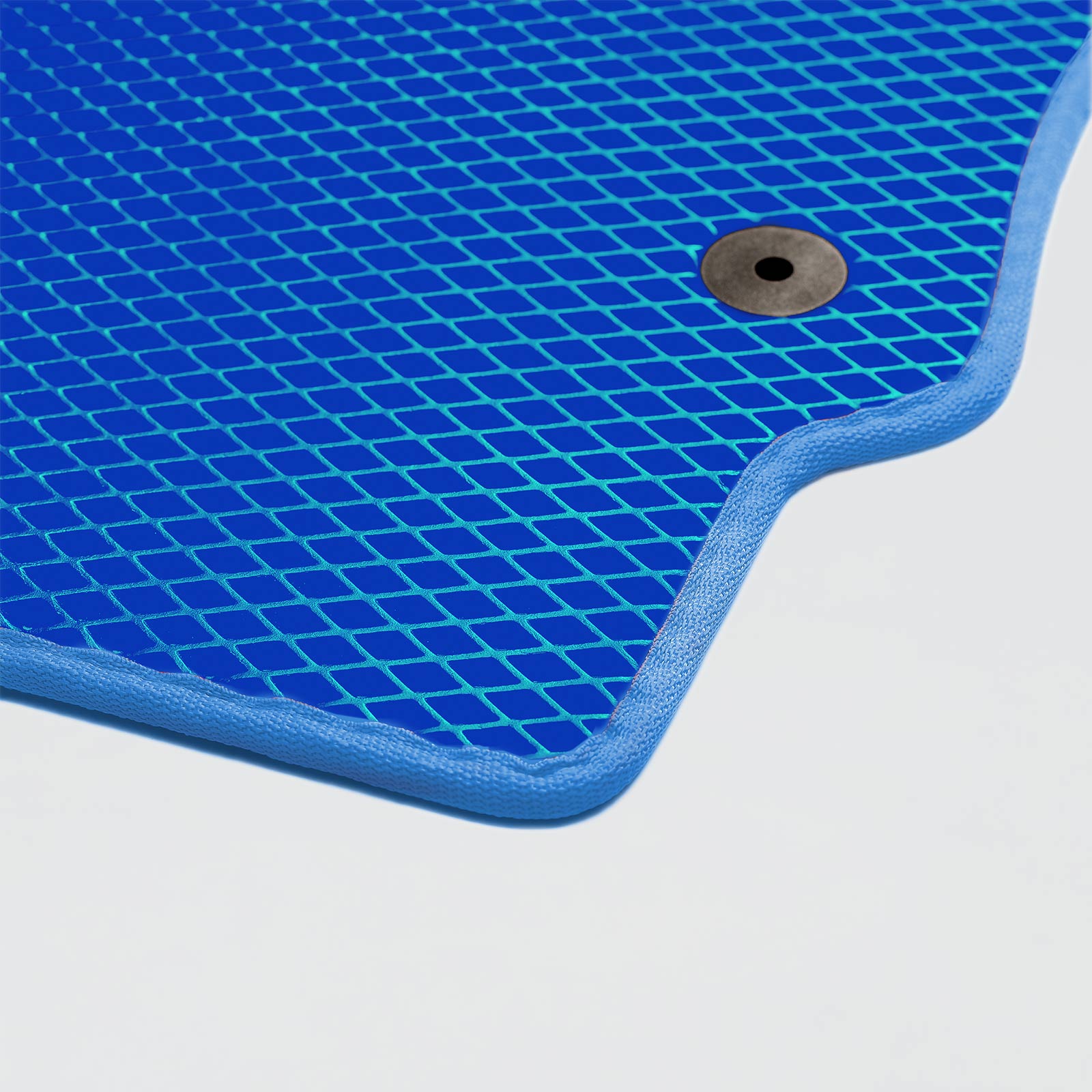 Textured blue mat with a grid pattern and a central grommet