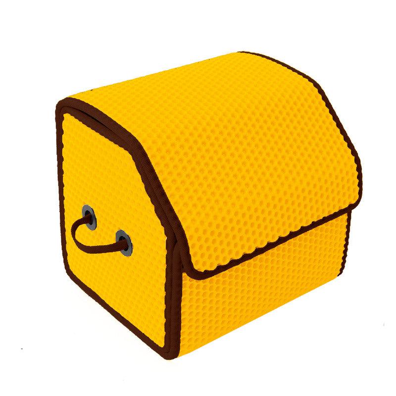 Yellow insulated lunch bag with a textured surface and brown trim.