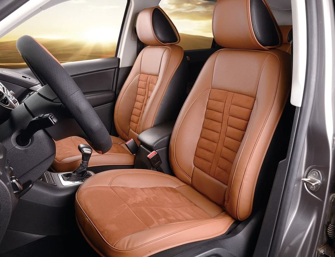 Brown leather car seats with ergonomic design and stylish stitching.