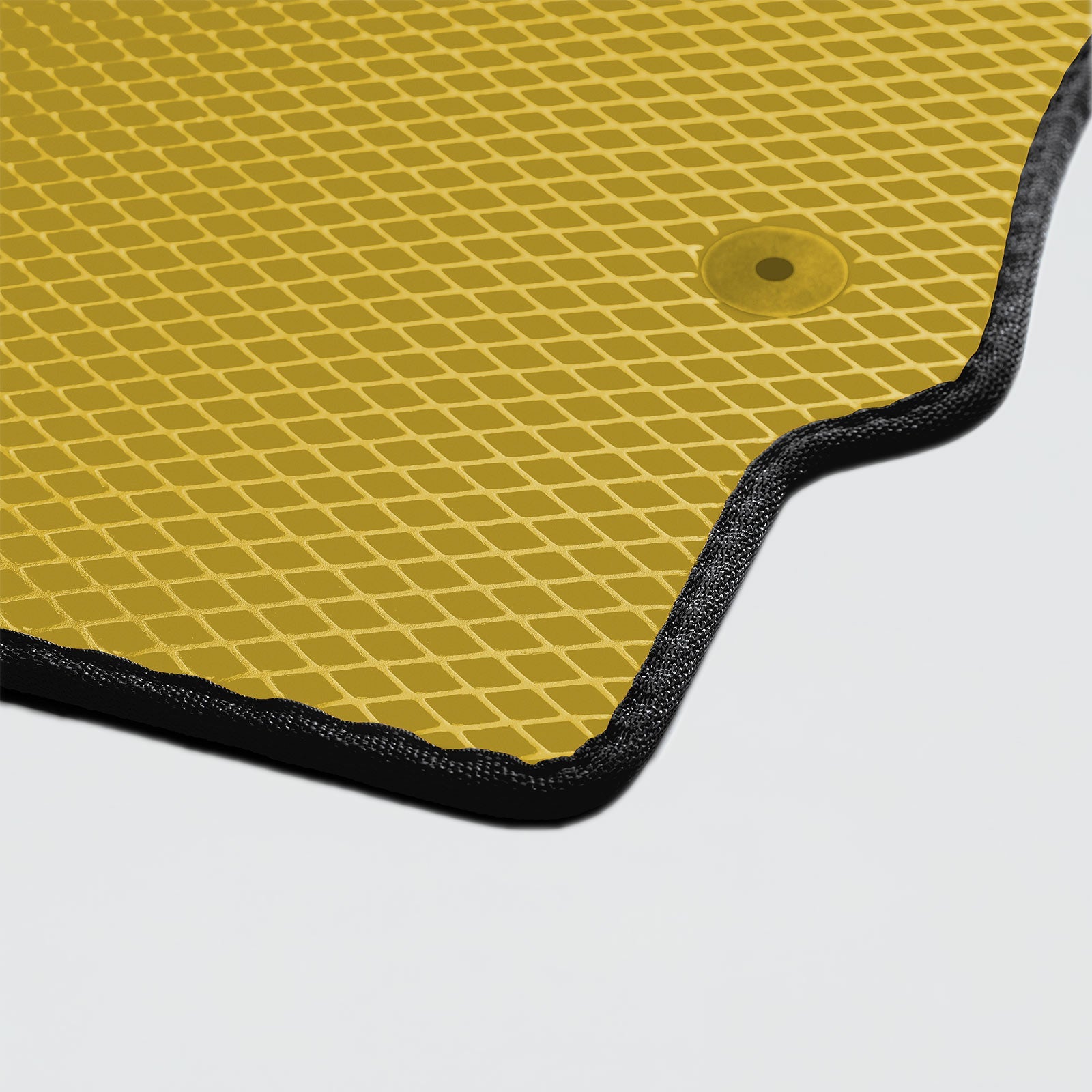 Yellow car floor mat with black border, custom fit for micro 2-seater, waterproof EVA, bespoke design for ultimate protection.