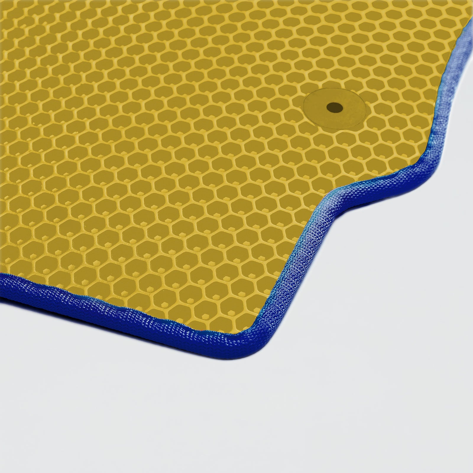 Yellow van mat with dark blue border, showcasing Prime EVA design for van floor protection. Easy-to-clean, water-resistant texture.