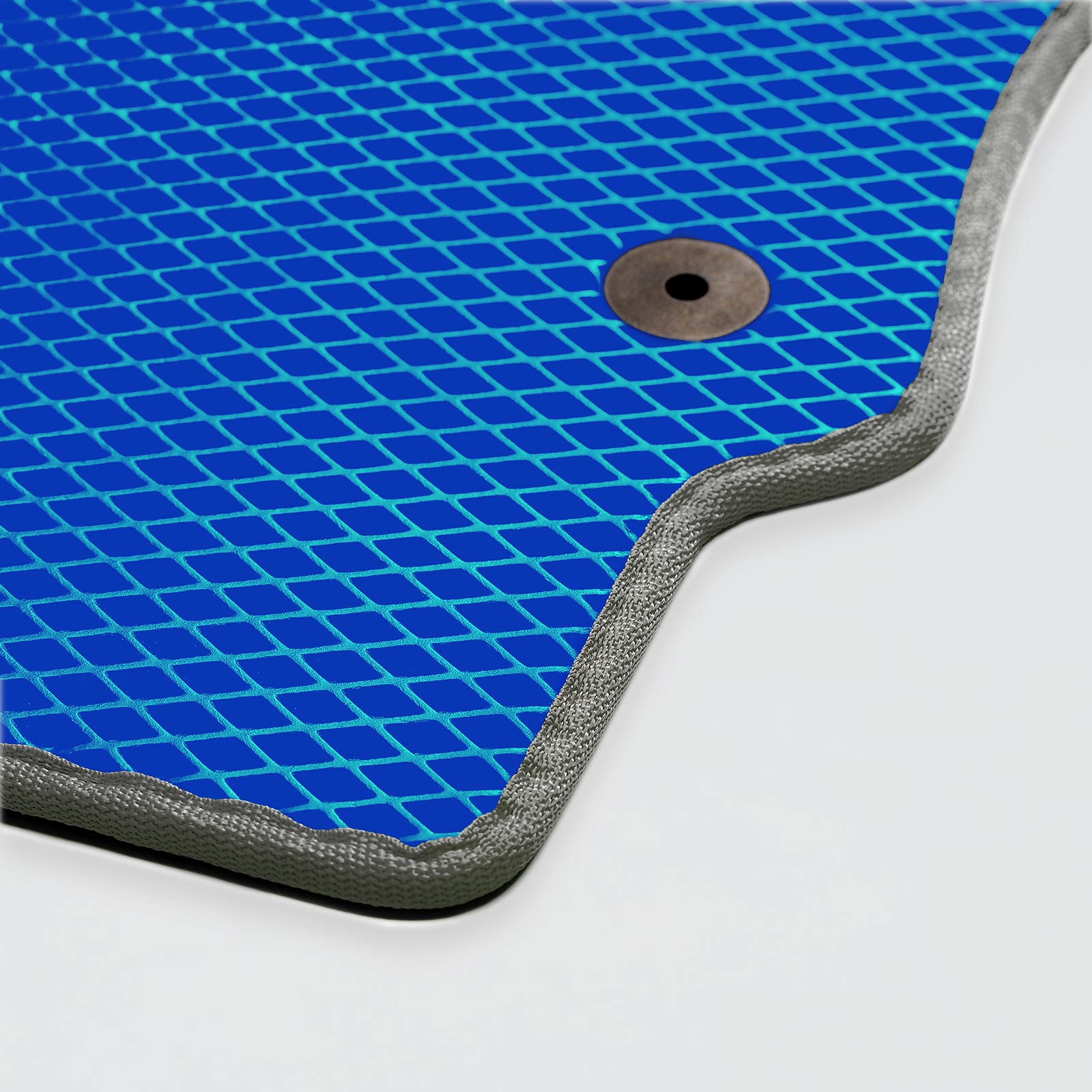 Blue textured mat with gray border and a circular hole for drainage or securing