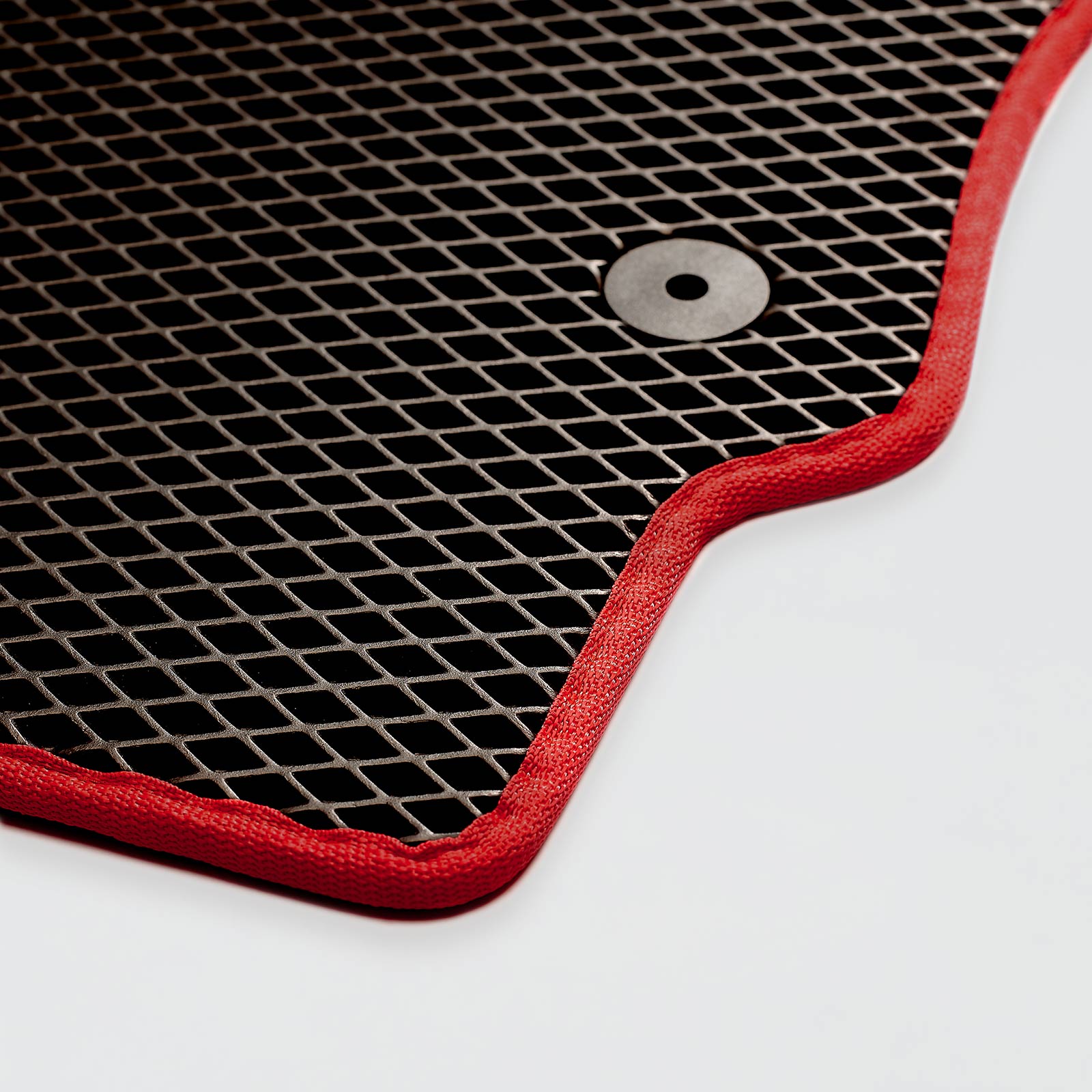 Durable black rubber mat with red edges and textured surface