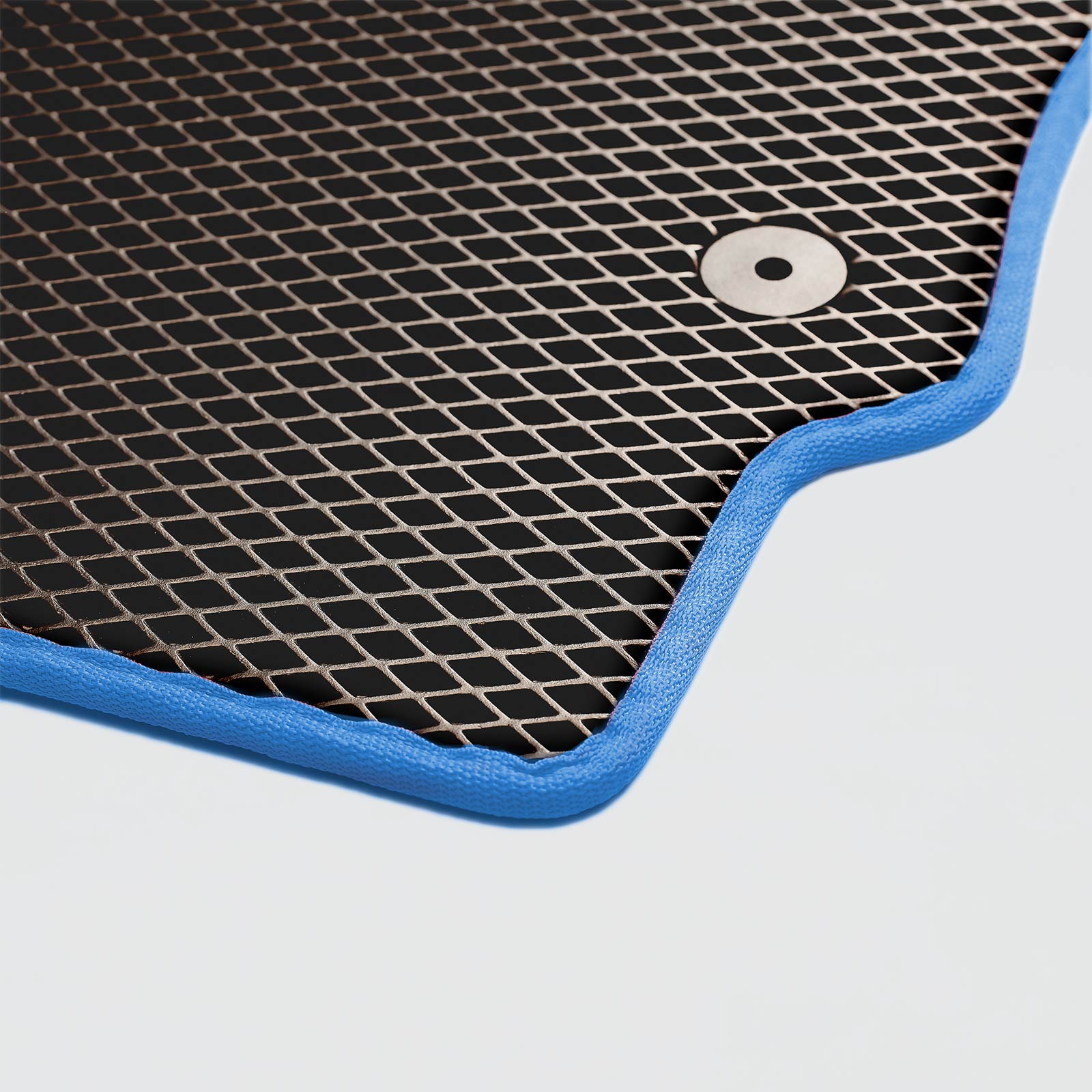 Black textured mat with blue edging and a circular metal fastener