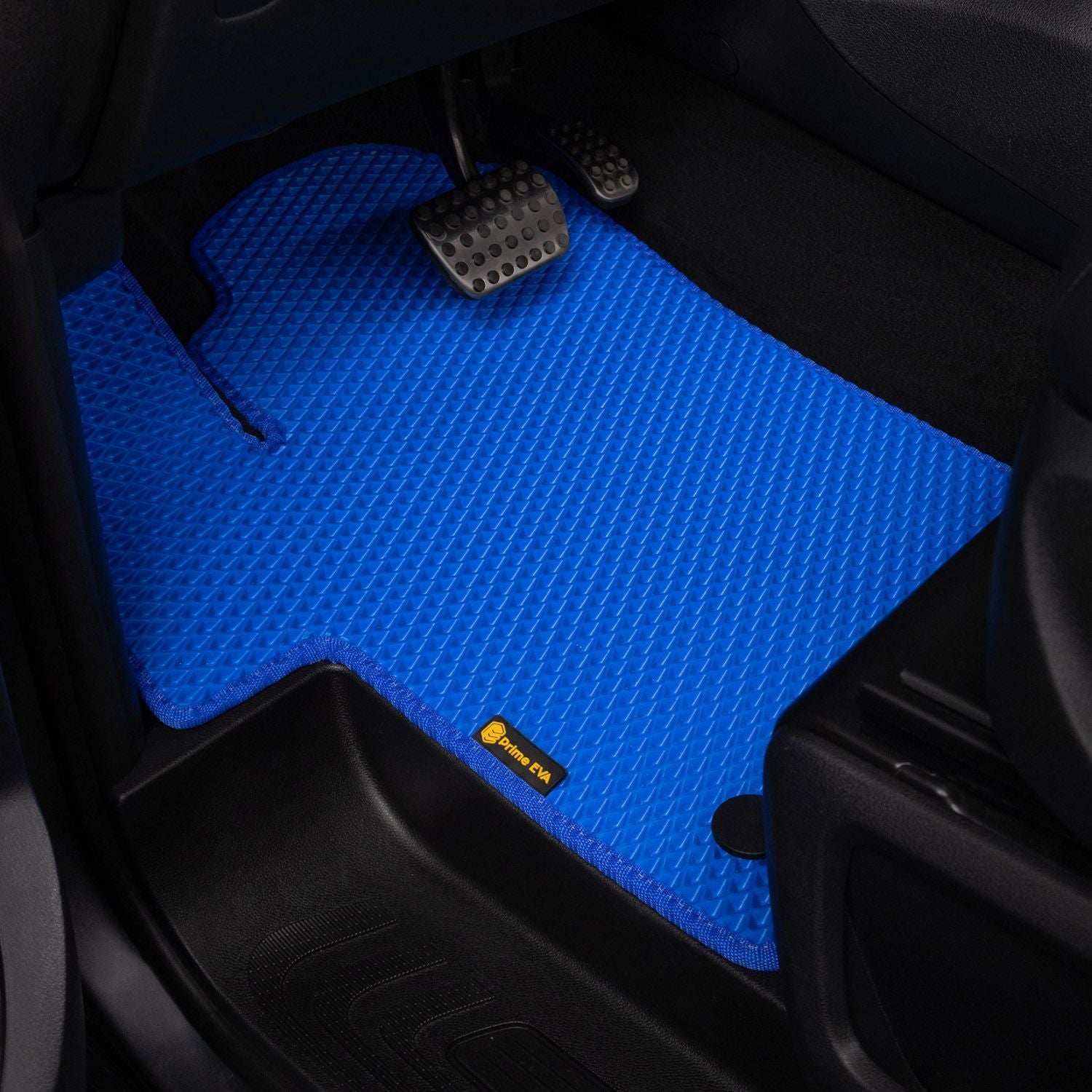 Blue textured car floor mat with a durable, water-resistant surface.