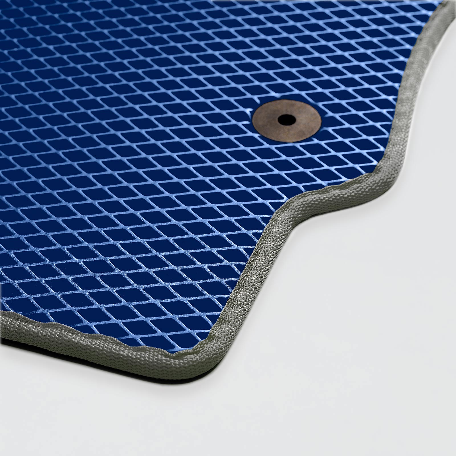 Blue textured mat with a silver outline and a circular hole