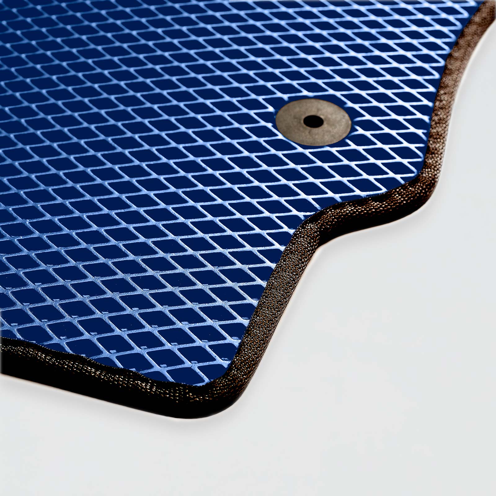 Blue rubber mat with a textured surface and a round hole in one corner