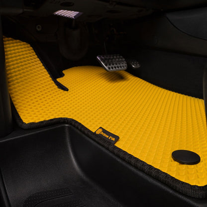 Bright yellow car floor mat with a textured pattern and Prime EVA branding.