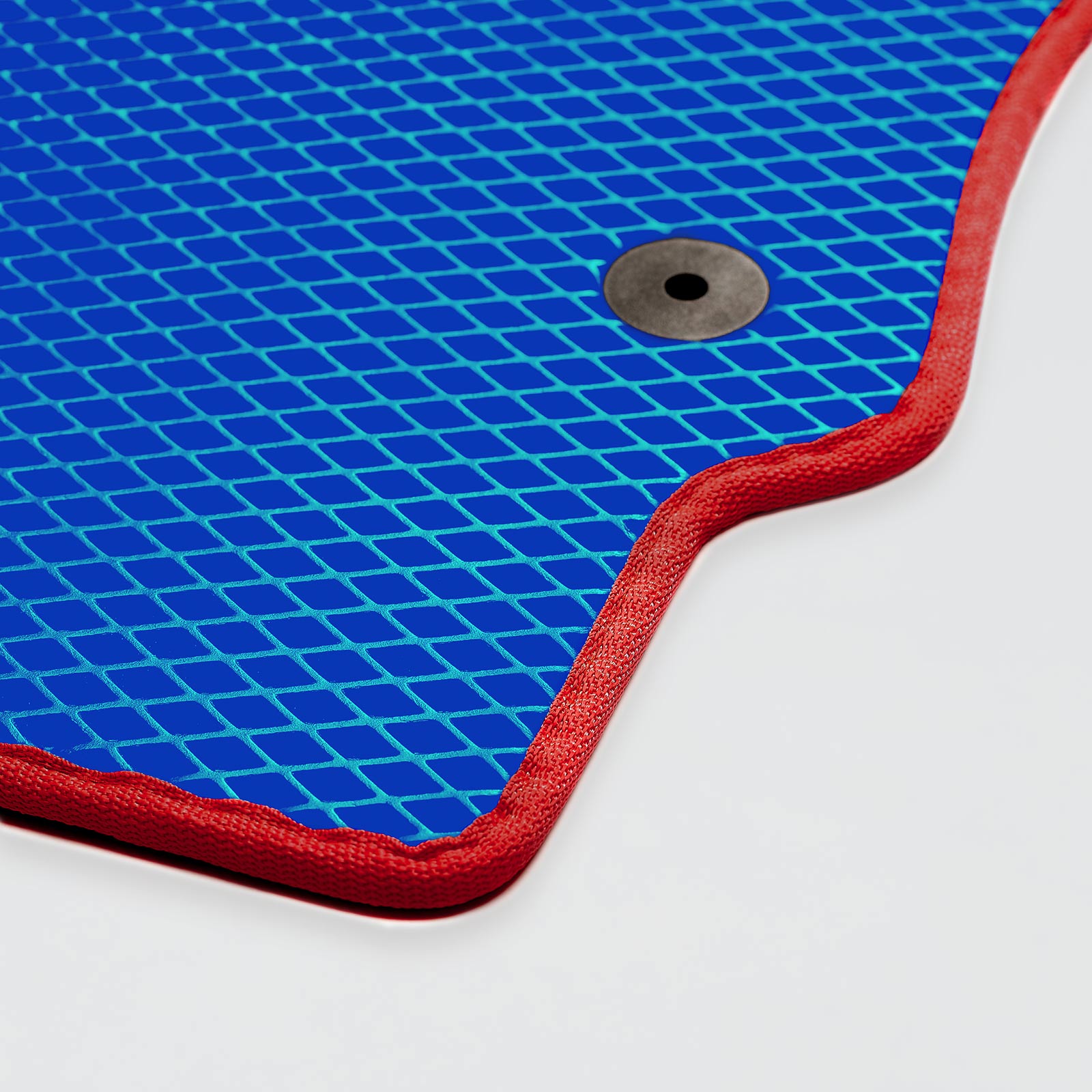 Blue textured mat with a red border and a circular hole on one side.