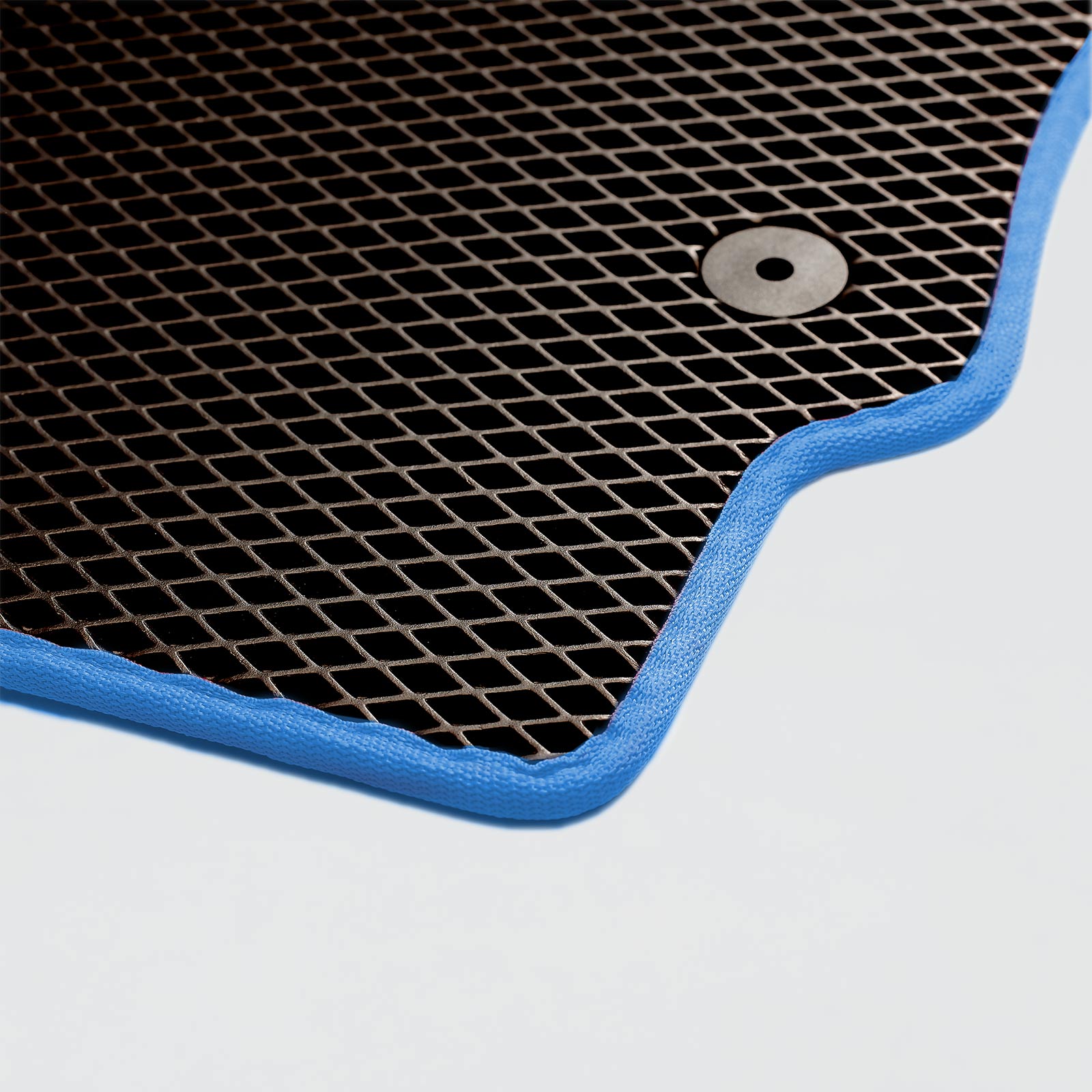 Black textured mat with blue edging and a circular hole for mounting.