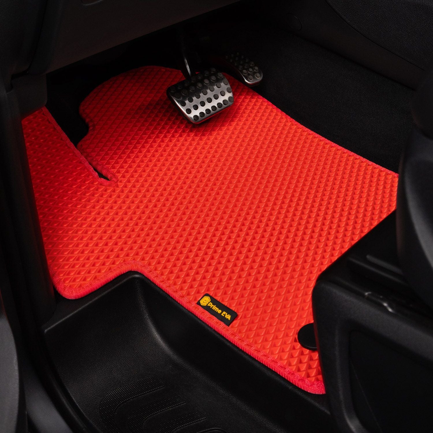 Red textured car floor mat with a stylish design and non-slip surface.