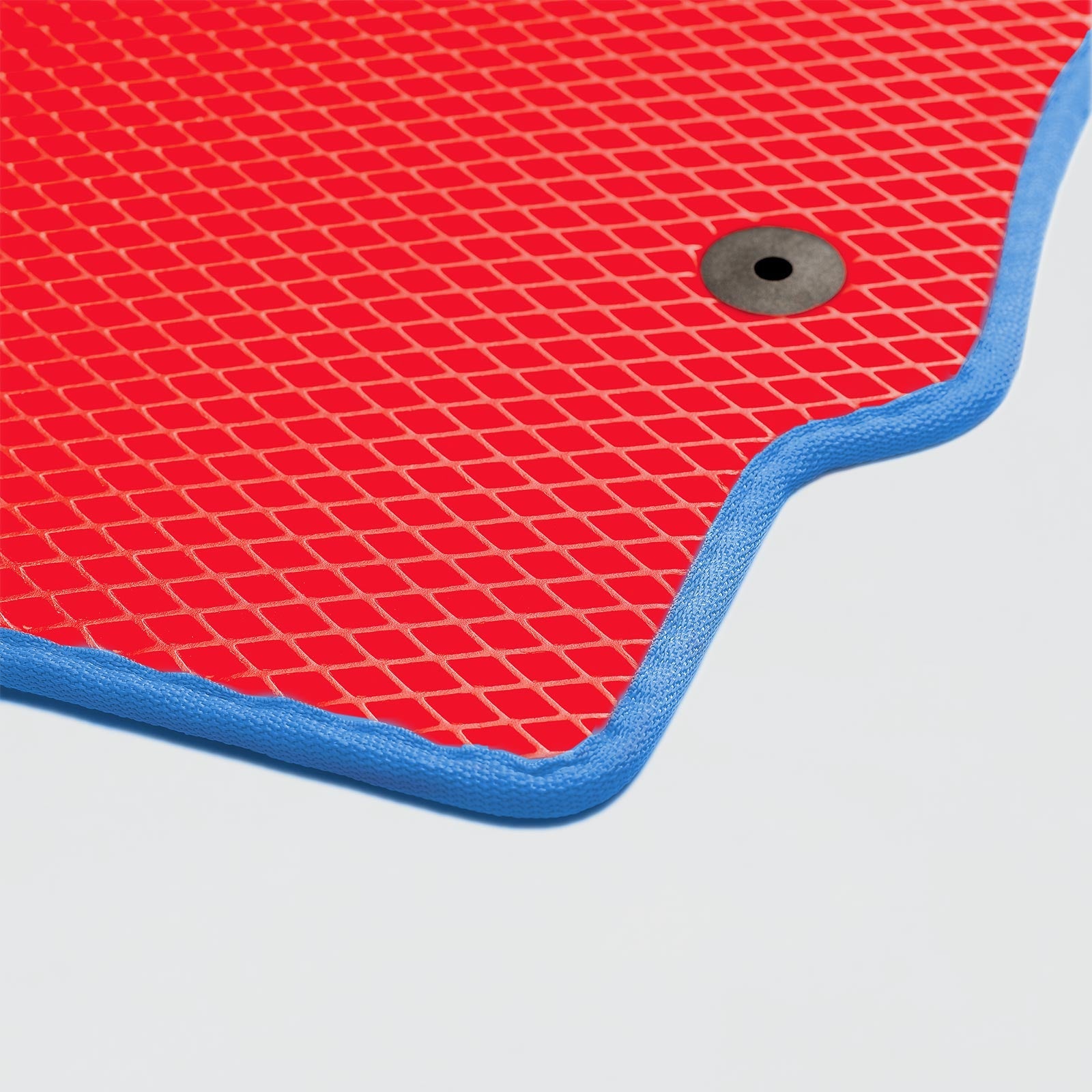 Red textured mat with a blue border and a central eyelet for hanging